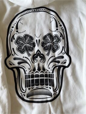 White Hoodie with Black Decorative Skull Graphic
